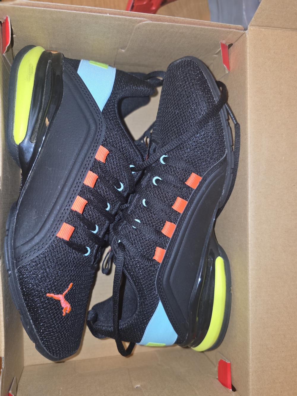 Puma Kids Black Sneakers with Neon Yellow, Orange & Light Blue Accents